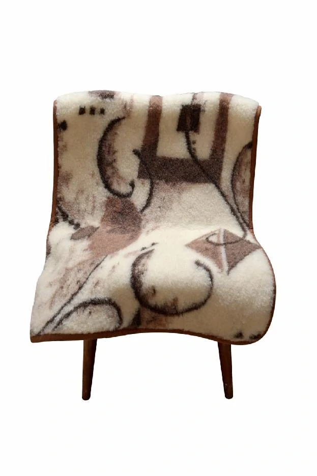 Vlněný přehoz na křeslo s motívem